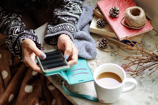 Girl using mobile phone and typing domain name without searching.